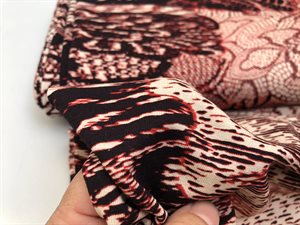 Viscosejersey - blomstret mønstret tryk i varme røde toner